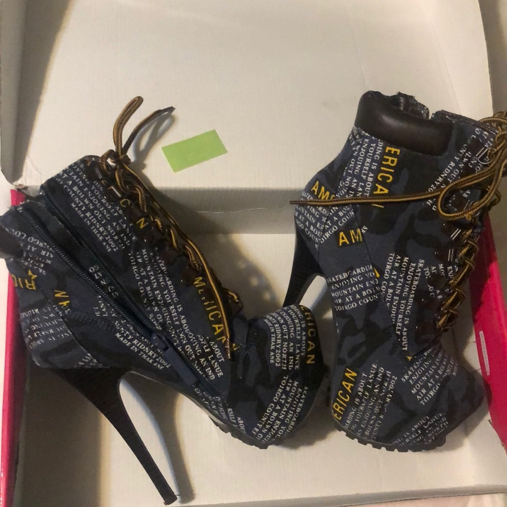 Blue military type boot with heel and platform. Great condition.